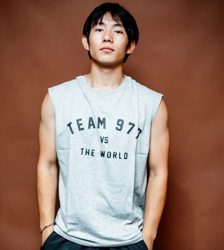 977 vs The World Singlet